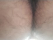 A hairy Japanese man squats and masturbates. The contraction of his anus at moment of ejaculation