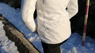 She decides to pee in front of everyone in the middle of the road