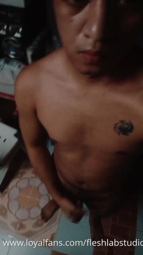 Filipino Twink Jerks Off in Shared Living Room While Housemate Sits Next Door