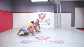 Intense Mixed Wrestling Match with Hot Tattooed Milf and Big Dick Action
