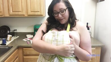 Busty housewife strips naked apron on in steamy kitchen
