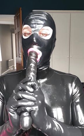 Latex sissy doll fetish, practicing deepthroating and popping in a vibrating butt plug