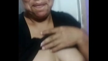 Shy but sexy latina housewife showing her natural tits by WhatsApp. She has nice dark nipples. Her name is Marcela