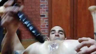 Stud fucks himself senseless using a thick dildo