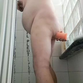 Fistdildo in shower