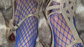 Melove in Blue Fishnet in High Heels Showing Purple Nail polish