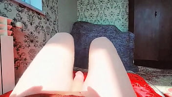 Playful femboy sipping milkshake through pink straw
