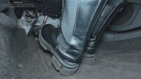 Driving in chunky black leather Chelsea boots