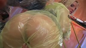 Blonde MILF in Raincoat Sucks Plastic Wrapped Cock