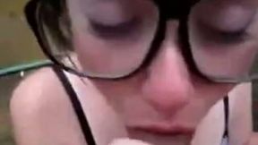 Nerdy girl is sucking on my dick with all the passion she has