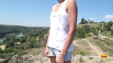 Braless hiker flashes on the beach her small pale tits