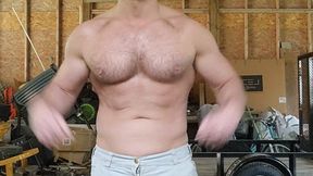 Muscle hunk pulls out his big dick