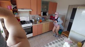 Amateur couple having fun in the kitchen.