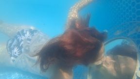 Underwater kissing a mirror, sticking out my tongue and blowing bubbles
