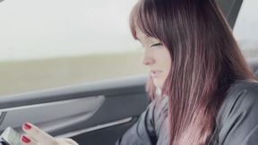 Hitchhiker having fun with driver in car