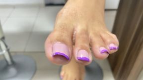 Perfect feet with purple French manicure.