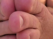 kicking back in bed, wiggling MY toes and stroking MY cock....