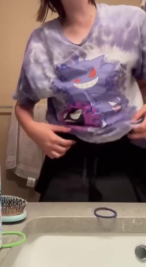 Petite teen with natural tits plays with her boobs
