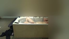 Lying in the bathtub and relaxing 2
