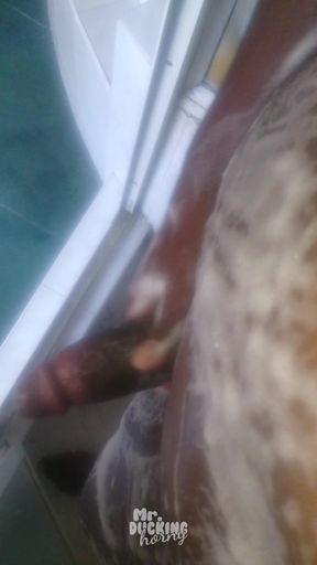 Black VHM having a steamy shower