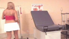 Flat chested girl masturbates on the gyno table