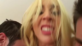 kelly wells drinks cum from two cocks after threesome
