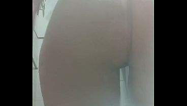 Pregnant MILF shows off her curvy body in the shower