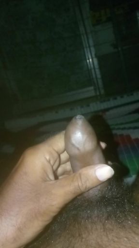 Shaking the Dick by hand job working at night in the bed.