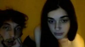 Skinny and cute brunette teen is fed with a dick on webcam