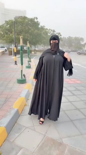 Standing hijabi Muslim girl gets off on her own in a private moment