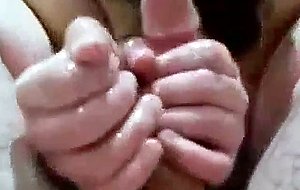 Busty girlfriend jerks cock in bathtub