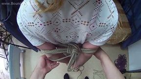 Barefoot Bianca in white lace t-shirt and jeans shorts is being hogtied with natural hemp rope on-screen - POV video (HD MP4)
