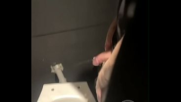 In a Club, Boy Enters the Toilets, Opens a Cubicle and Catch a Guy About to Pee.