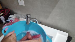 Camgirl showing everyday life, talking and cleaning toys
