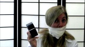 Bondage gear seller's gag demonstration!