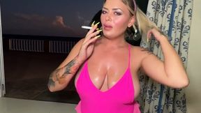 Barbie smokes a cigarette