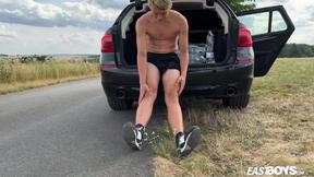 Cute teen blonde boy shows off his abs