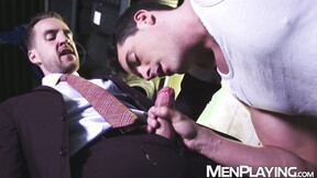 ”Suited businessman Mark Blue drills deep into mechanic Presley Scott”