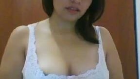 Amazing pretty and a bit shy amateur webcam gal played with her titties