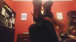 all naked, upside down on the chair with a strange noise