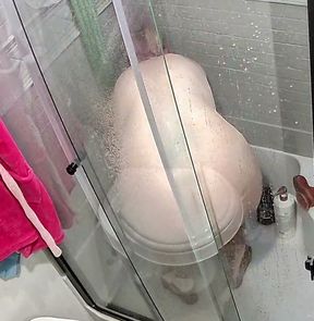 I was hot, wet, and horny in the shower and just had to fuck both my holes.