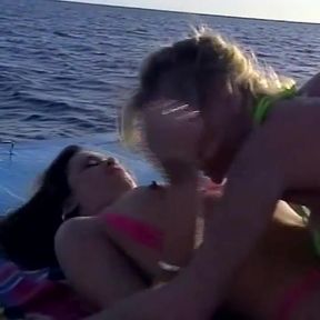 Lesbians pussy licking fingering on the beach