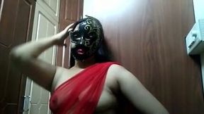 Wearing a frightening mask webcam Indian girl plays with her boobs