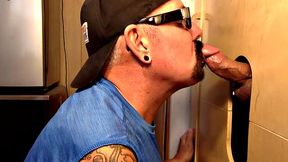 Gray gaydaddy giving head and tug to gloryhole top