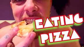 Eating pizza