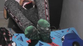 Taking a rest with my barefeet and sweaty green socks at night