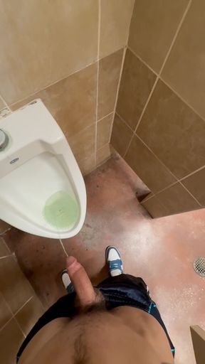 Twink pees on his own penis in public