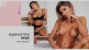 Against the wall