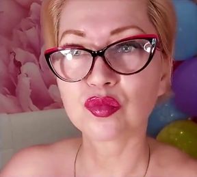 Dildoing of a Mature Bitch on a Background of Colorful Balloons