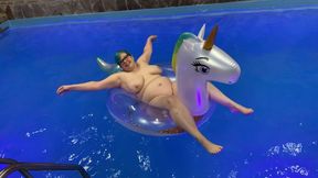 Goth BBW on an inflatable unicorn pool float